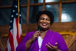Stacey Abrams with microphone