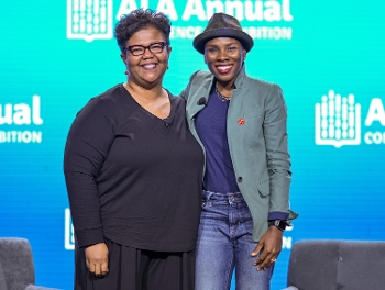 Nicole A. Cooke and Luvvie Ajayi Jones standing together