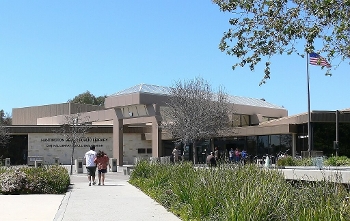 exterior Huntington Beach Public Library with people on walkway