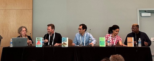 Barbara Hoffert seated with authors on stage