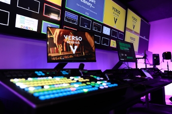 Verso Studios broadcast control suite, with monitors and mixing boards lit up