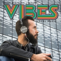 profile photo of a man with a beard wearing large headphones