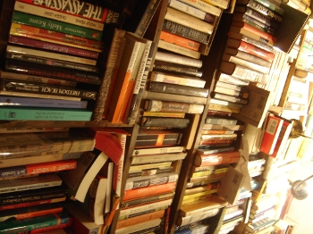 Photography of very tightly packed bookshelves