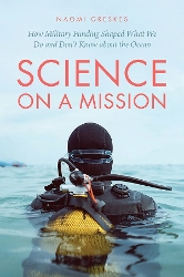Cover of Science on a Mission: How Military Funding Shaped What We Do and Don't Know About the Ocean (photo of a man in black scuba gear, partially submerged, shot from behind near the surface of still water).