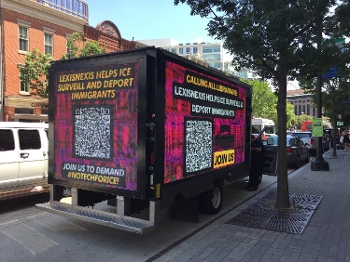truck parked on DC street with message: