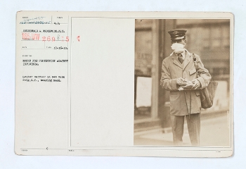 Mail carrier wearing mask during 1918 flu pandemic