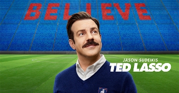 Ted Lasso Promotional image with Jason Sudeikis in foreground on English football field